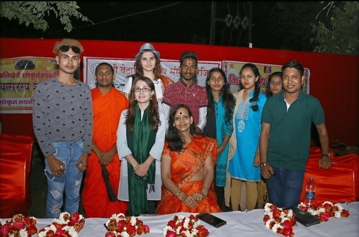 Dr. Kiran Jaitley with a group at a community gathering